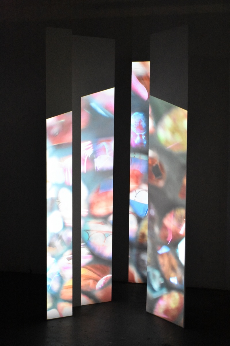 This is an art Portfolio by Priti Patel. The light installation is Fragmented and it  shows fragments of images that look like stained glass. The fragments are traumatic memories that emerge and disappear like glimmers of coloured lights. The full image shows but the memory is still fragmented. The fragments emerge to the rhythm of the song by First Aid Kit, You are the Problem Here. 
